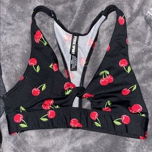 pink sports bra/ swim top with cherrys
